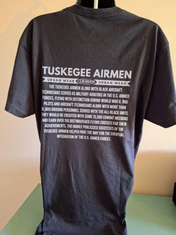 A black t-shirt with the words tuskegee airmen on it.