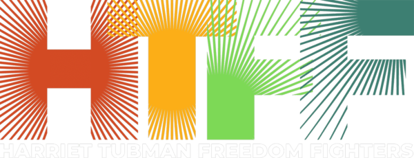 A green and yellow logo with the words " human freedom ".