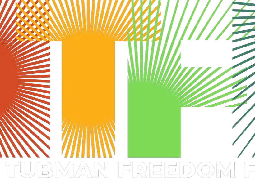A green and yellow logo with the words " human freedom ".